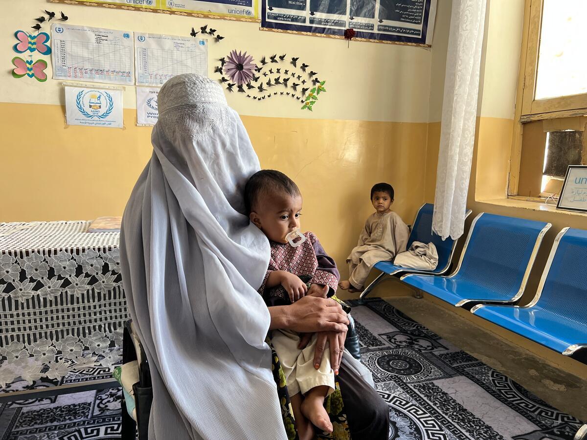 Afghanistan. Farida, a mother with two malnourished children came to a WFP supported clinic in Kandahar to receive nutrition support.